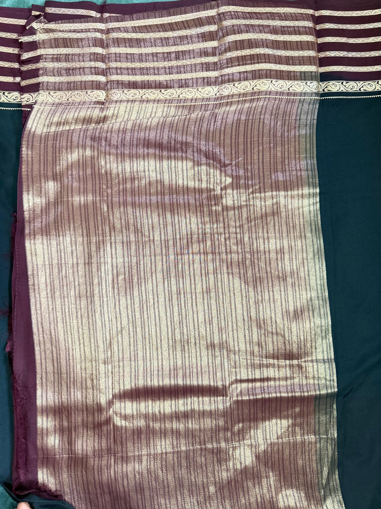Striped fabric with a pattern on a dark background