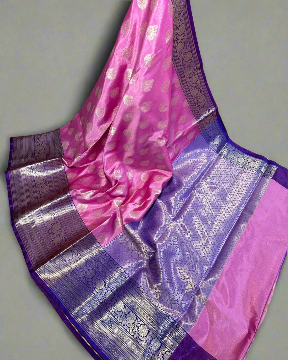 Purple and pink saree with a white background