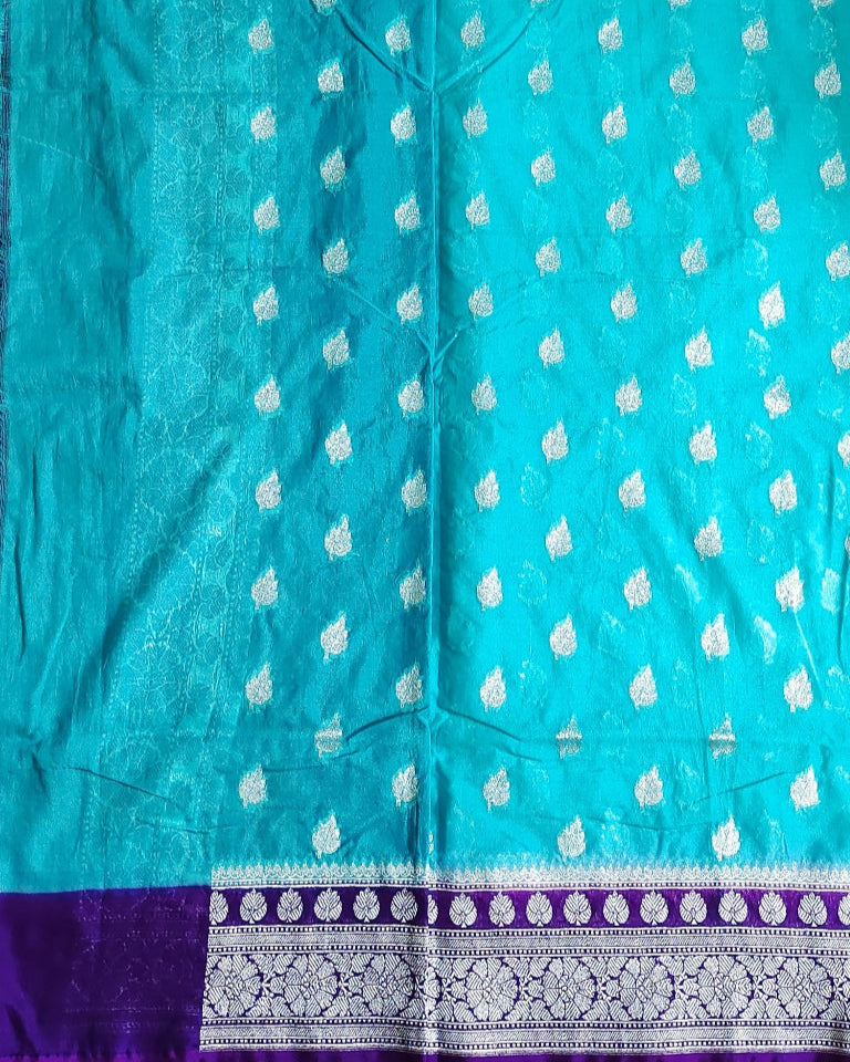 Semi Banarasi Katan Georgette Saree in Teal Blue with Purple Zari Border