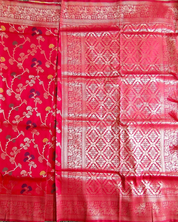 Red saree with floral patterns and geometric designs
