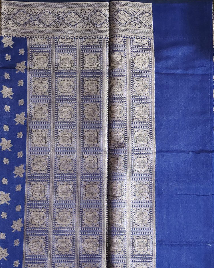 Blue fabric with intricate white patterns