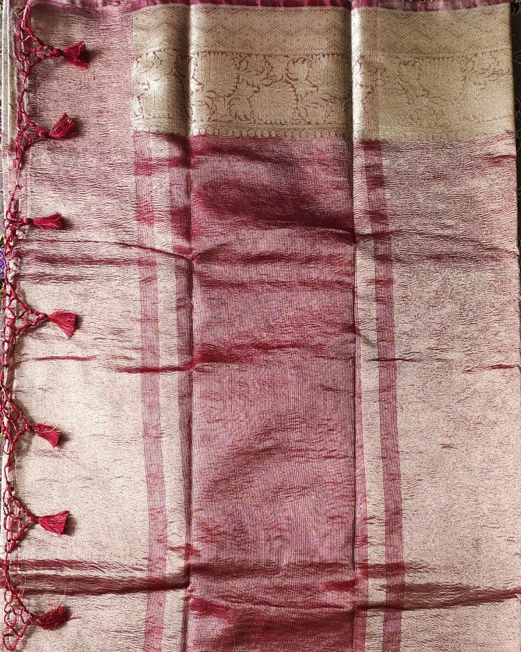 Textured fabric with red and beige patterns