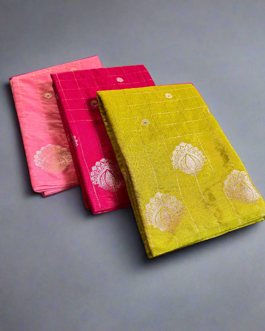 Stack of colorful fabric pieces on a textured surface
