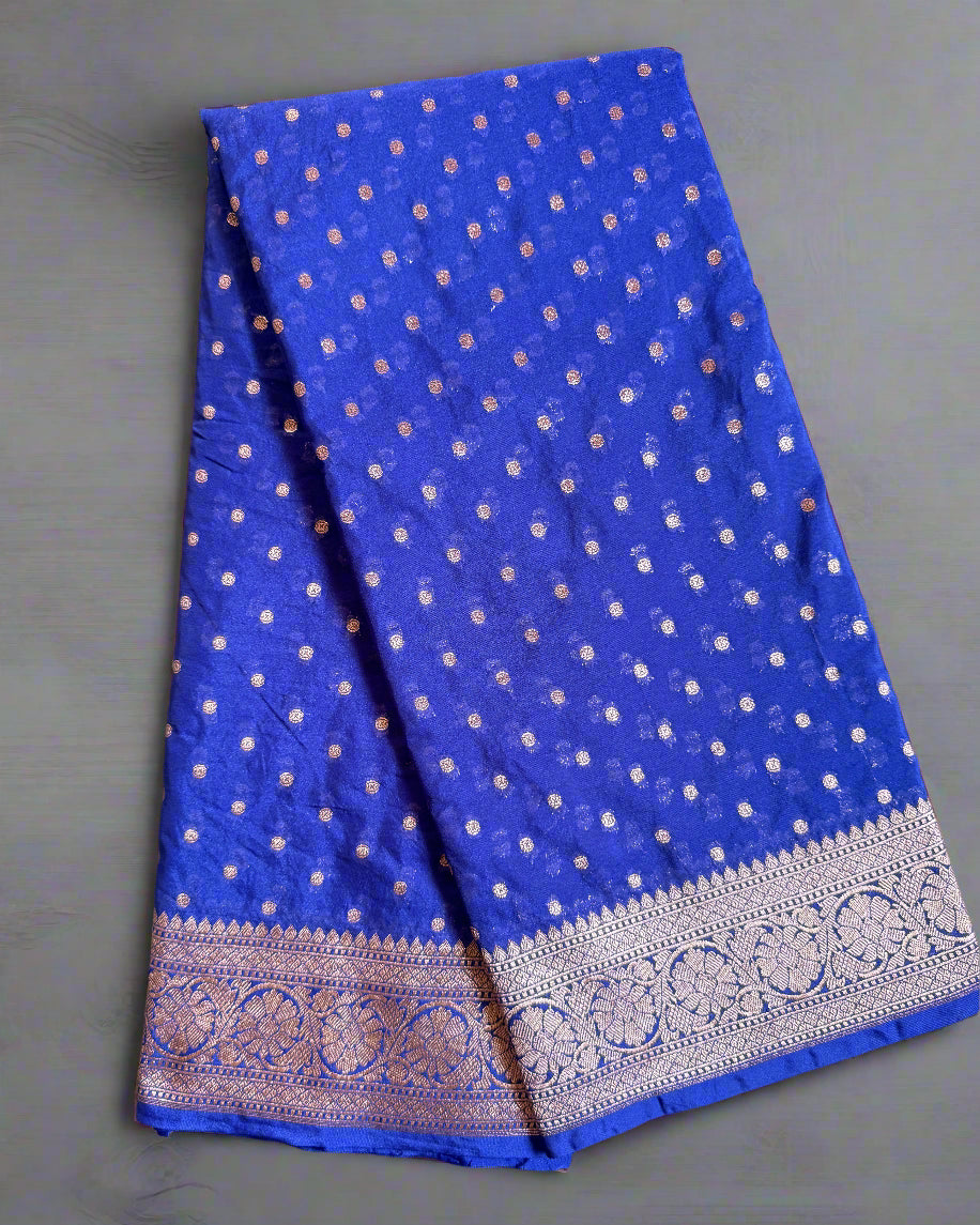 Blue fabric with white patterns on a gray background