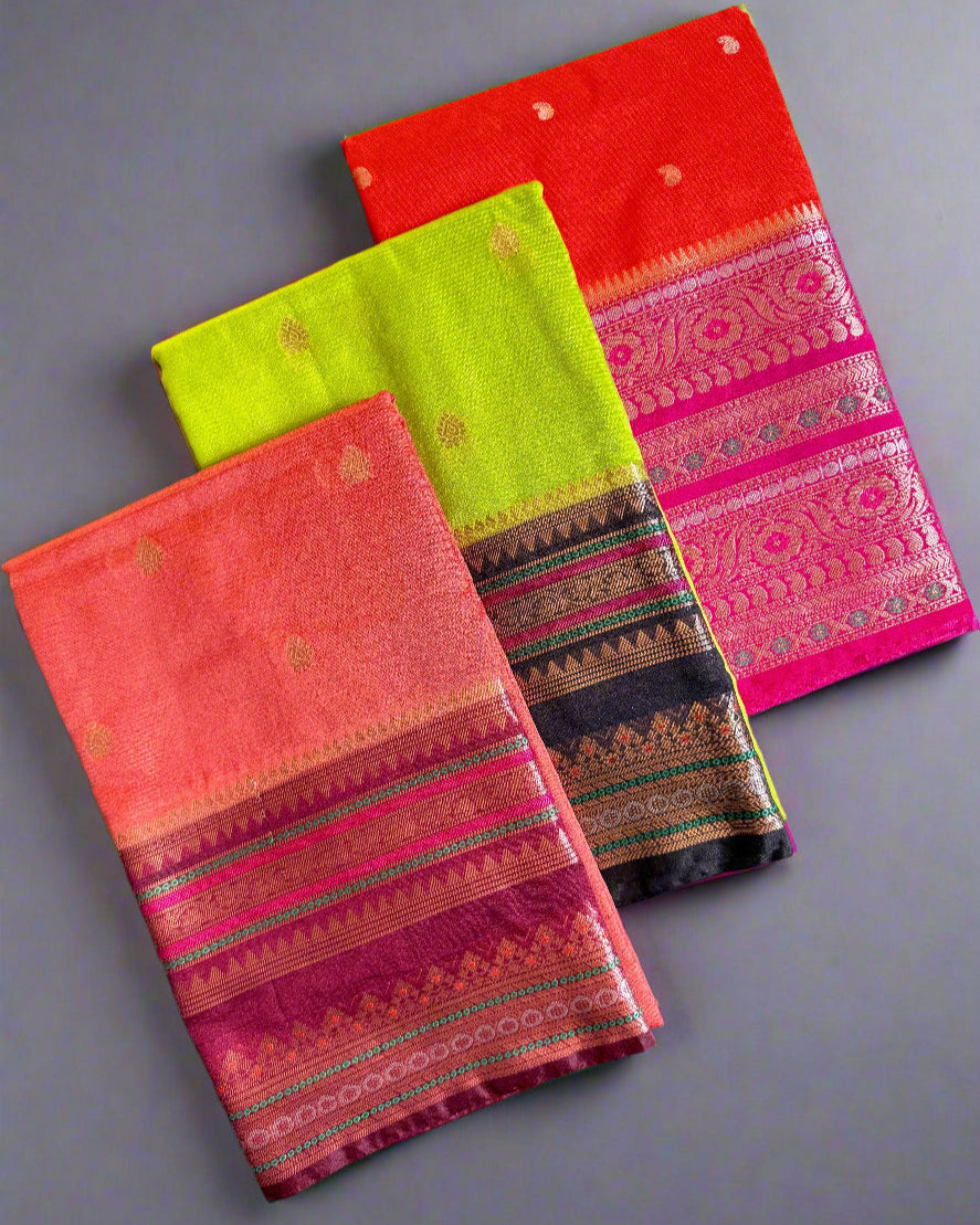Three colorful fabric pouches on a textured gray surface
