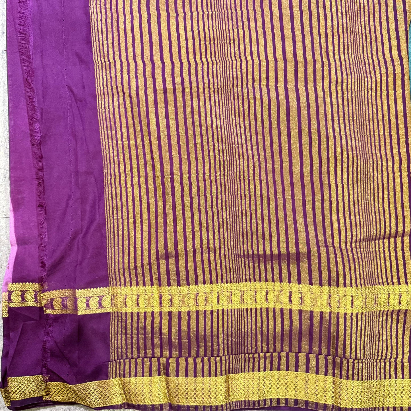 Purple fabric with a gold border. Digital semi Mysore Silk Crepe Saree