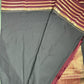 black saree with maroon and gold border