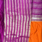Purple and orange fabric with striped pattern