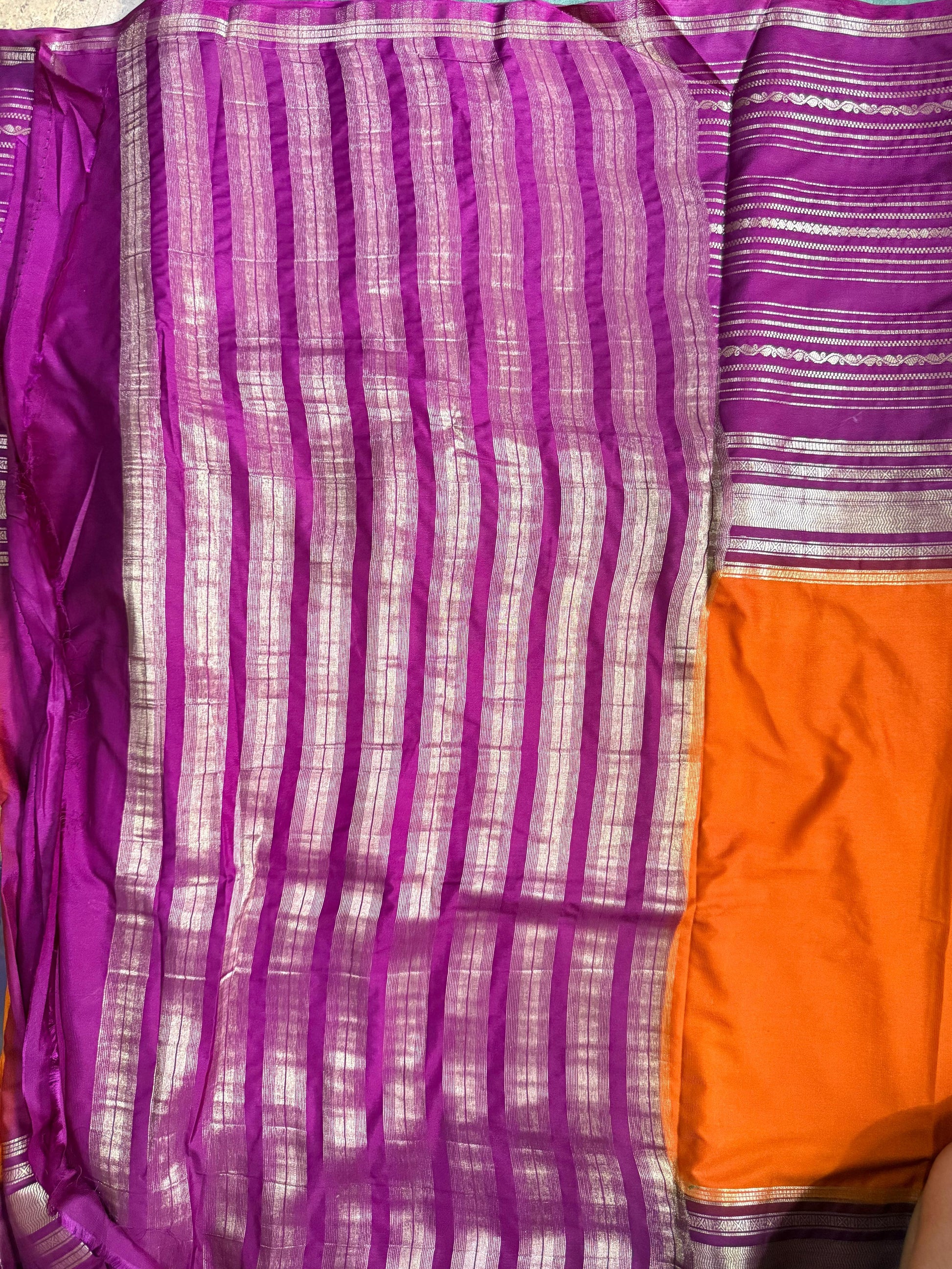 Purple and orange fabric with striped pattern