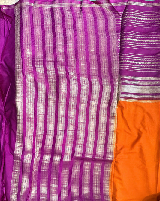 Purple and orange fabric with striped pattern