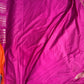 Purple fabric with a pink border on a gray background