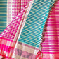 Pink and blue striped fabric with a checkered pattern