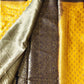 Close-up of a yellow and gray patterned fabric