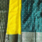 Saree with green, yellow, and blue patterns