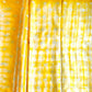 Yellow fabric with white patterns and border