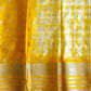 Yellow fabric with white patterns
