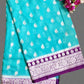 Semi Banarasi Katan Georgette Saree in Teal Blue with Purple Zari Border