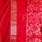 Red saree with floral patterns and intricate border