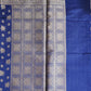 Blue fabric with intricate white patterns