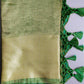A green and beige Banarasi handwoven crush tissue silk saree with zari weave pallu and blouse, .