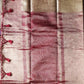 Textured fabric with red and beige patterns