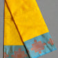 Yellow saree with blue border and red patterns 