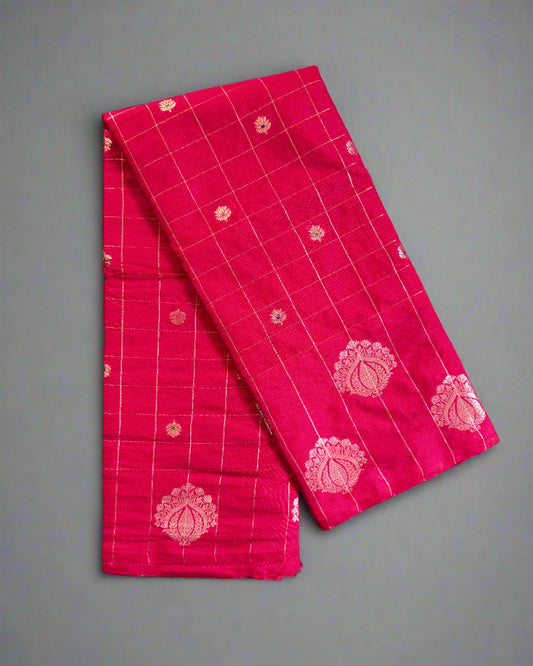 Red fabric with white patterns on a gray surface