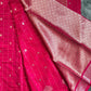 Red fabric with gold patterns and designs