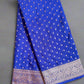 Blue fabric with white patterns on a gray background