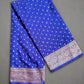 Blue fabric with white patterns on a gray background