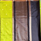 Sari with a black, brown, and green pattern on a gray background