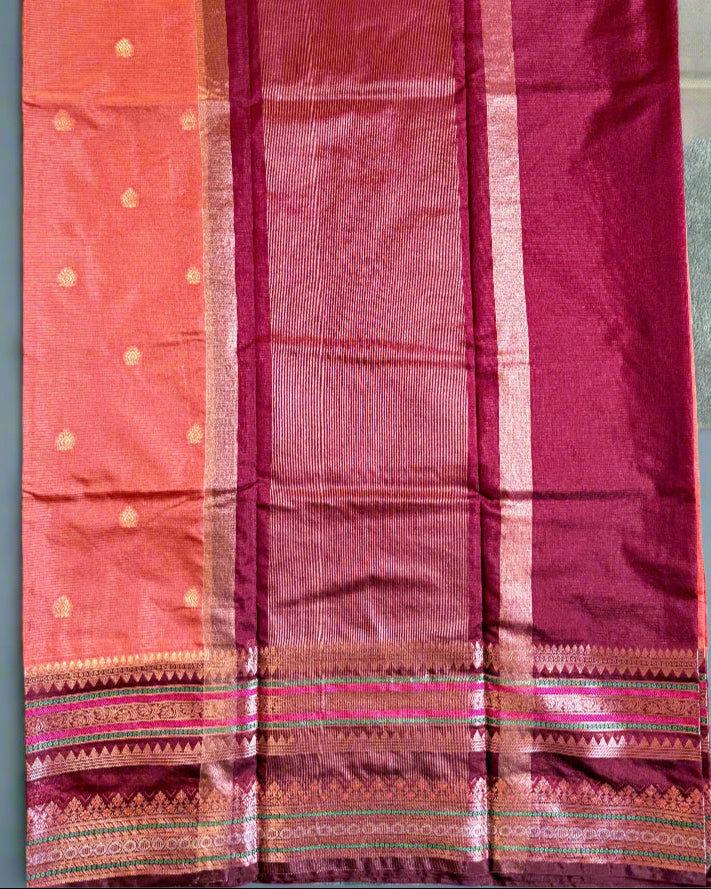 Saree with a checkered pattern on a green background