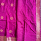 Purple fabric with gold circular patterns and a border
