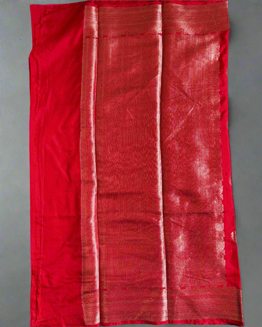 Red fabric on a textured gray surface
