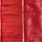 Close-up of a red fabric with a textured pattern
