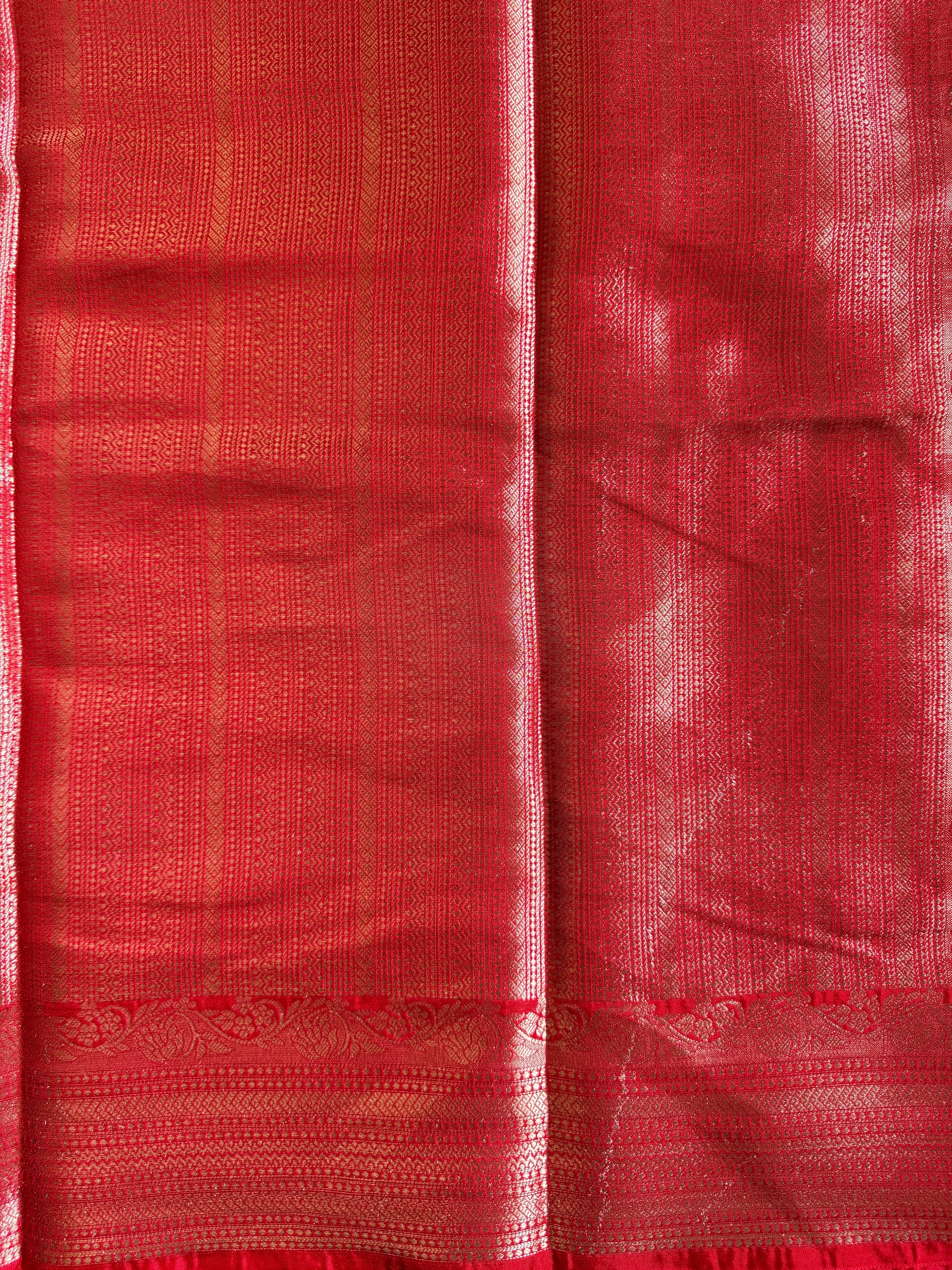 Close-up of a red fabric with a textured pattern