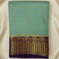 Teal fabric with gold and purple border on a white background