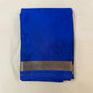 Blue saree with a gold border on a beige background
